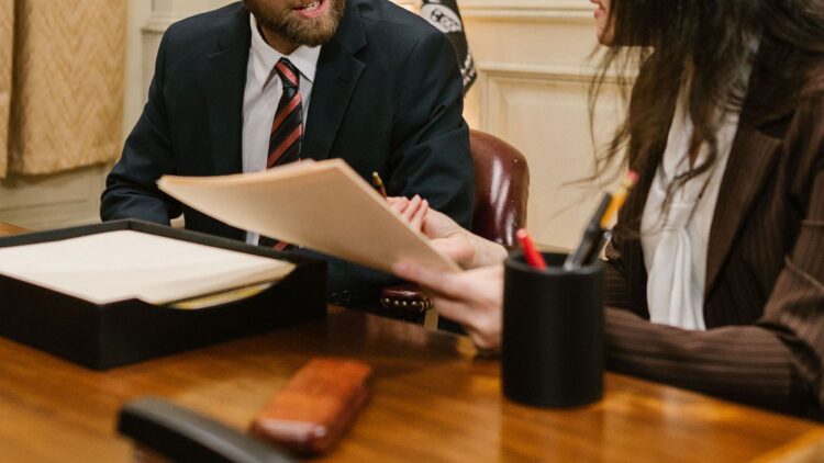 Legal professionals reviewing documents